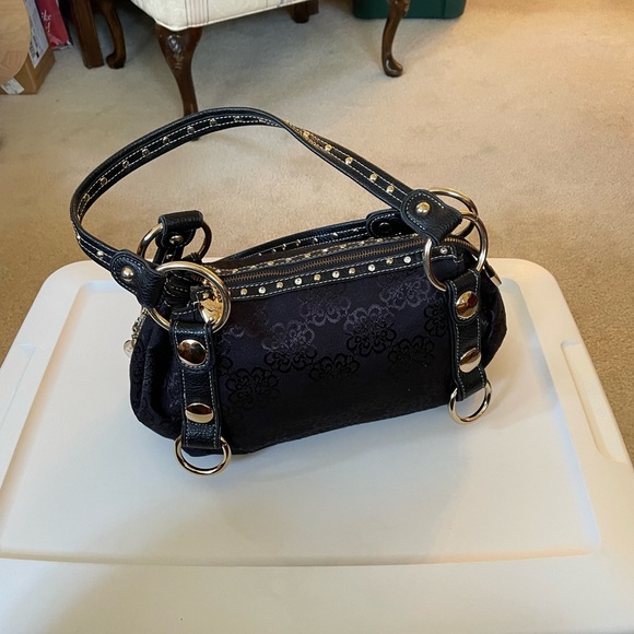 Elegant Black Handbag with Gold Accents - Picture 2 of 4